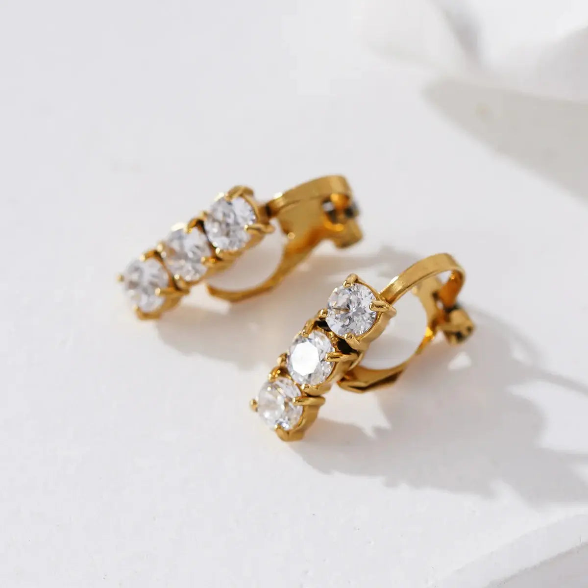 Boucle d'oreille triple strass dorée Lina shop