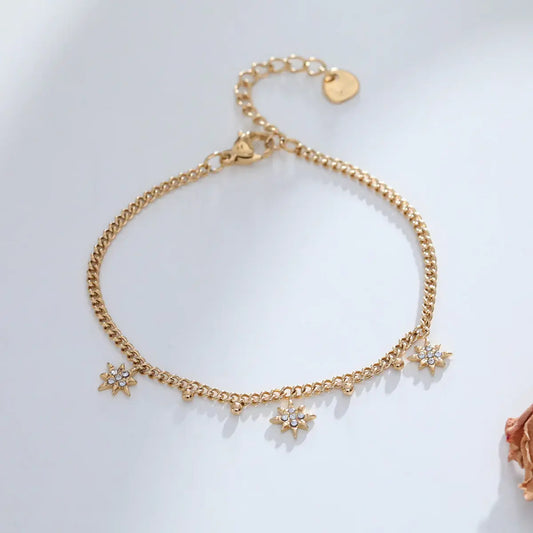 Bracelet chaîne dorée avec pendentifs étoiles avec strass Lina shop