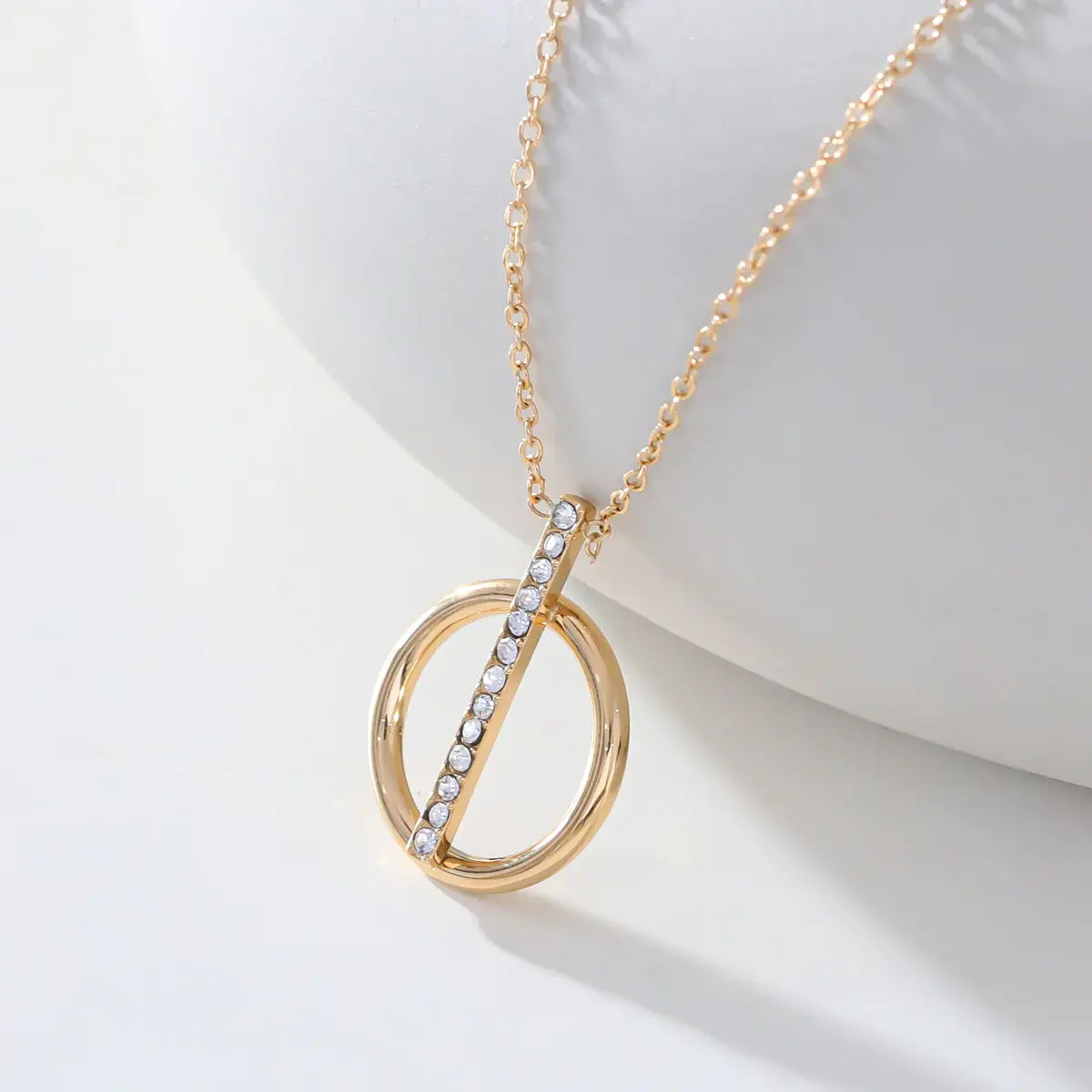 Collier chaîne dorée avec pendentif rond et barre en strass Lina shop