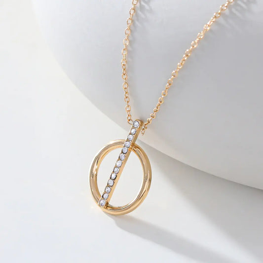 Collier chaîne dorée avec pendentif rond et barre en strass Lina shop