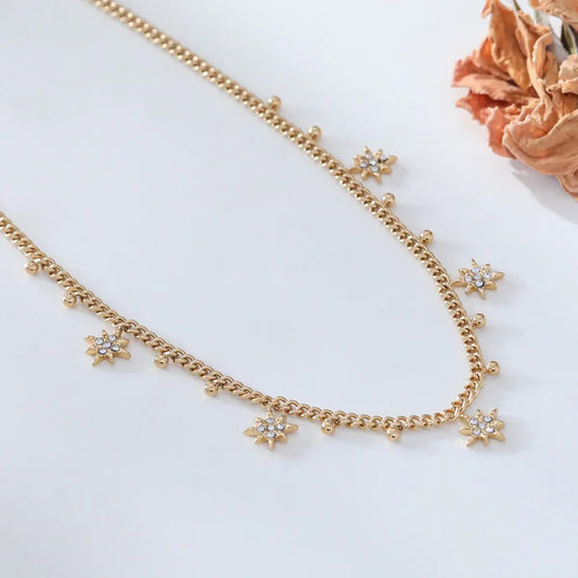 Collier chaîne épaisse dorée avec pendentifs étoilés Lina shop