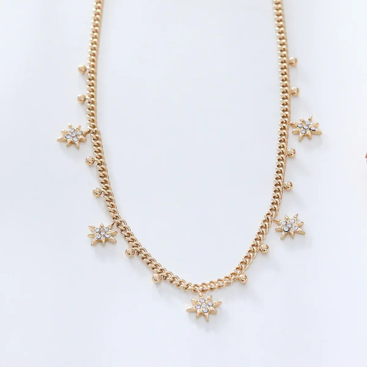 Collier chaîne épaisse dorée avec pendentifs étoilés Lina shop